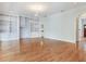 Spacious living room with hardwood floors and built-in bookshelves at 2927 W Bayshore Ct, Tampa, FL 33611