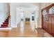 Bright living room with fireplace, hardwood floors, large windows, and open floor plan showcases spacious living at 2927 W Bayshore Ct, Tampa, FL 33611