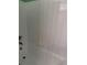 White bathtub with tiled wall and shower head at 3001 58Th Ave S # 1103, St Petersburg, FL 33712