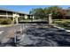 Gated entrance to the community with mature landscaping and well-maintained grounds at 3001 58Th Ave S # 1103, St Petersburg, FL 33712