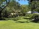 Lush green space with mature trees and well-maintained lawn at 3001 58Th Ave S # 1103, St Petersburg, FL 33712