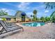 Community pool and sunbathing area, providing a refreshing and relaxing space for residents at 3001 58Th Ave S # 1103, St Petersburg, FL 33712