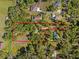 An aerial view shows a property outlined in red, featuring lush trees at 308 N Smokey Mountain Rd, Seffner, FL 33584