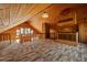 Second view of bonus room featuring wood-paneled walls, a wooden bar, and plenty of natural light from the multiple windows at 308 N Smokey Mountain Rd, Seffner, FL 33584