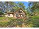 Charming home exterior with a neutral color palette and a welcoming front entrance at 308 N Smokey Mountain Rd, Seffner, FL 33584