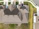 An aerial view of a well-maintained roof on a residential home with clean lines and excellent condition at 3138 Victoria Inlet Dr, Holiday, FL 34691