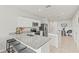 Well-lit kitchen with stainless steel appliances, granite countertops, and a functional layout for easy cooking at 3138 Victoria Inlet Dr, Holiday, FL 34691
