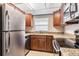 Kitchen with updated countertops and stainless steel appliances at 320 N Bayshore Blvd # 208, Clearwater, FL 33759