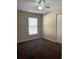 Cozy bedroom with standard window, carpeted floor, ceiling fan, and closet at 3211 E 23Rd Ave, Tampa, FL 33605