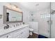 Contemporary bathroom with a walk-in shower, modern vanity, and stylish fixtures, providing a spa-like experience at 4105 W Fair Oaks Ave, Tampa, FL 33611