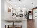 Modern kitchen with granite countertops, stainless steel appliances, and a convenient breakfast bar at 4105 W Fair Oaks Ave, Tampa, FL 33611