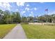 Well maintained community park featuring lush lawns, walking path and picnic area at 4206 Preserve Pl, Palm Harbor, FL 34685