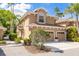 Inviting two-story home featuring manicured landscaping and an attached two-car garage at 4206 Preserve Pl, Palm Harbor, FL 34685