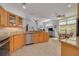Well-lit kitchen with granite countertops, stainless steel appliances, and tiled flooring at 4206 Preserve Pl, Palm Harbor, FL 34685