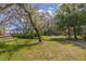Community park with waterfront pergola, walking path and mature trees at 4206 Preserve Pl, Palm Harbor, FL 34685
