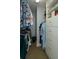 Walk-in closet with custom shelving for optimal storage and organization of clothes and accessories at 4910 Bay Ne St # 308, St Petersburg, FL 33703
