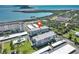 Beautiful coastal condominium complex with lush landscaping and water views from every unit at 5 Island Park Pl # 305, Dunedin, FL 34698