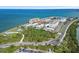 Coastal condominium community with water views, convenient beach access, and well-maintained landscaping at 5 Island Park Pl # 305, Dunedin, FL 34698