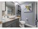 Stylish bathroom with a modern vanity, vessel sink, and a large mirror at 5 Island Park Pl # 305, Dunedin, FL 34698