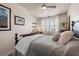 Bedroom with a ceiling fan and desk by the window at 5 Island Park Pl # 305, Dunedin, FL 34698