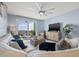 Spacious living room with balcony access offers stunning views at 5 Island Park Pl # 305, Dunedin, FL 34698