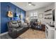 Comfortable office space with a leather sofa and work area at 5 Island Park Pl # 305, Dunedin, FL 34698