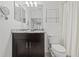 Bathroom with a dark wood vanity, marble countertop, a large mirror, and a shower with a tub at 5000 Culbreath Key Way # 8-308, Tampa, FL 33611