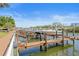 Community boat docks providing convenient access for residents to enjoy boating and water activities on the waterway at 5000 Culbreath Key Way # 8-308, Tampa, FL 33611