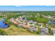 Birds eye view shows a home nestled in a well maintained community with lush, natural surroundings at 5137 Epping Ln, Zephyrhills, FL 33541