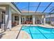 Enjoy this sparkling pool with a brick paver deck and covered lanai that offers relaxing outdoor living at 5137 Epping Ln, Zephyrhills, FL 33541