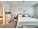Serene bedroom with a comfortable bed, neutral tones, and ample natural light at 527 Manns Harbor Dr, Apollo Beach, FL 33572