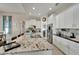 Large kitchen featuring granite countertops, stainless steel appliances, and ample cabinet space at 527 Manns Harbor Dr, Apollo Beach, FL 33572