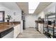 Bright kitchen features a modern dishwasher, ample storage, and stylish backsplash with modern appliances at 6265 Sun Blvd # 1201, St Petersburg, FL 33715