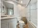 Bathroom featuring vanity with solid surface countertop, a toilet, and a shower and bath combination at 6495 Shoreline Dr # 8106, St Petersburg, FL 33708