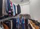 Walk-in closet featuring wire shelving, hanging rods, and organized clothing storage at 6495 Shoreline Dr # 8106, St Petersburg, FL 33708
