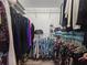 Walk-in closet featuring wire shelving, hanging rods, and organized clothing storage at 6495 Shoreline Dr # 8106, St Petersburg, FL 33708