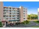 Condominium complex with private patios, covered parking, and well maintained landscape at 6495 Shoreline Dr # 8106, St Petersburg, FL 33708