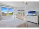 A spacious main bedroom is brightened with a large window at 6495 Shoreline Dr # 8106, St Petersburg, FL 33708