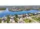 Waterfront home in a coastal neighborhood with private docks and lush landscaping at 6603 Seabird Way, Apollo Beach, FL 33572