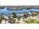 Beautiful waterfront home with a private boat dock and stunning aerial views of the surrounding area at 6603 Seabird Way, Apollo Beach, FL 33572