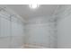 Walk-in closet with ample shelving for storage, providing organized space at 6603 Seabird Way, Apollo Beach, FL 33572