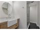 Stylish bathroom featuring a vessel sink, quartz countertop, and sleek glass-enclosed shower at 714 Bayshore Dr, Tarpon Springs, FL 34689