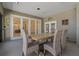 Outdoor dining area with a rustic wooden table and seating, perfect for al fresco meals at 714 Bayshore Dr, Tarpon Springs, FL 34689