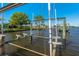 Waterfront dock featuring boat lift and lovely views at 714 Bayshore Dr, Tarpon Springs, FL 34689