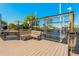 Waterfront dock featuring boat lift and seating area with lovely views at 714 Bayshore Dr, Tarpon Springs, FL 34689