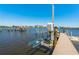 Waterfront dock featuring boat lift with lovely river views at 714 Bayshore Dr, Tarpon Springs, FL 34689