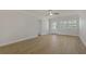 Bright living room with tile floors, front door, and view to the outside at 714 Bayshore Dr, Tarpon Springs, FL 34689