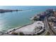 Stunning aerial view showcasing the property's prime coastal location and sandy beach access at 895 S Gulfview Blvd # 309, Clearwater Beach, FL 33767
