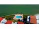 Aerial view showcasing a refreshing pool with waterfront views near condominium building at 895 S Gulfview Blvd # 309, Clearwater Beach, FL 33767