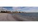 Beachfront view with clear blue waters, showcasing the scenic beauty of the coastal property at 895 S Gulfview Blvd # 309, Clearwater Beach, FL 33767
